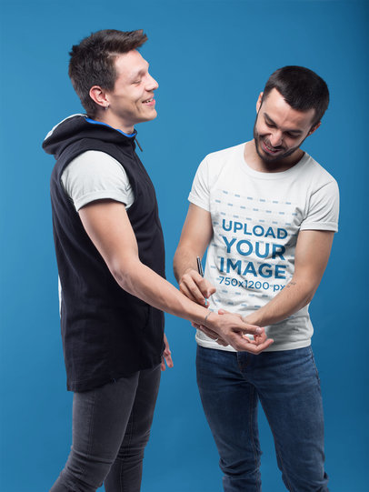 LGBT Shirts Mockup of a Man Drawing his Boyfriends Hand Wearing a T-Shirt