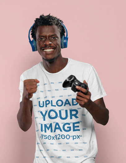T-Shirt Mockup of an Excited Man With Afro Hair Playing Virtual Games m26434 r-el2