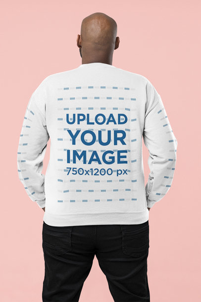Back-View Mockup of a Man Posing at a Studio Wearing a Sweatshirt with Customizable Sleeves