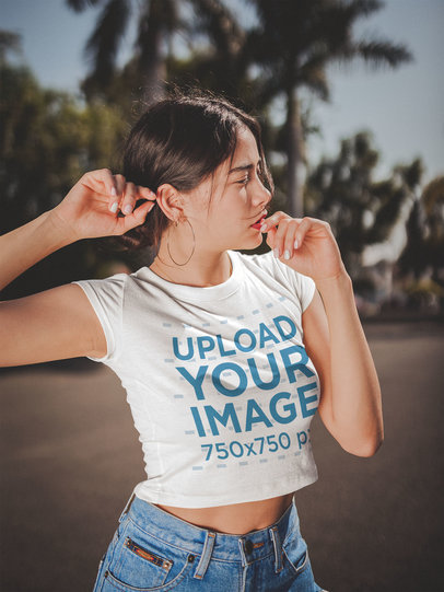 Asian Woman Wearing a Crop Top T-Shirt Mockup Under the Sun
