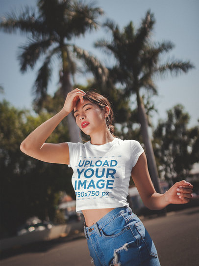 Mockup of a Woman Wearing a Crop Top on the Street