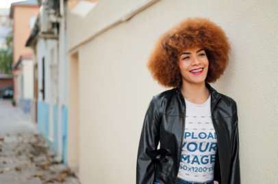 Mockup of a Smiling Woman with an Afro Hair Wearing a Heathered T-Shirt