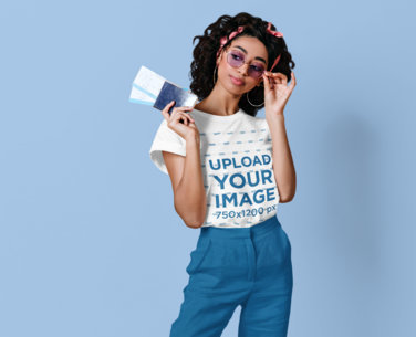 Crewneck Tee Mockup of a Woman with Rounded Glasses Holding Plane Tickets m29752 r-el2