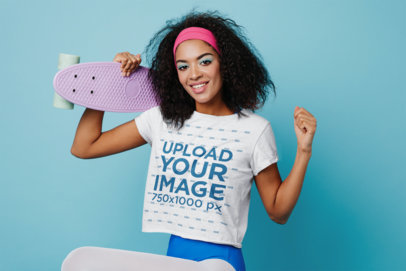 T-Shirt Mockup of a Woman with Afro Hair Wearing a Retro Skating Outfit