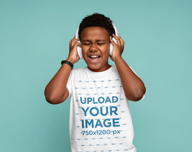 T-Shirt Mockup Featuring a Cheerful Boy Listening to Music