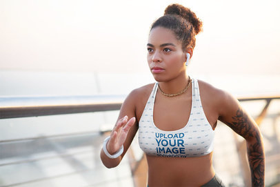 Sports Bra Mockup Featuring a Woman Focused on Running