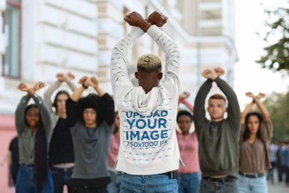 Back-View Hoodie Mockup of a Man Leading a Group of Protestors m29540 r-el2