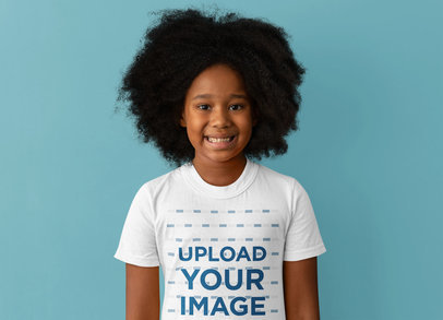 Round-Neck T-Shirt Mockup of a Smiling Girl with an Afro Hairstyle