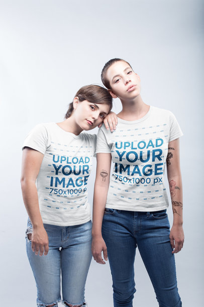 Mockup Featuring an LGBT Couple Wearing T-Shirts Against a White Background