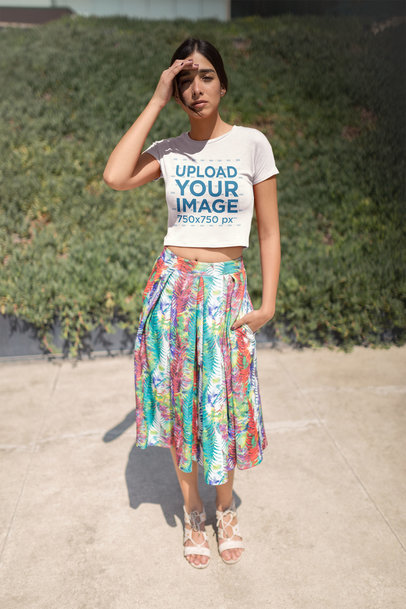 Pretty Woman Wearing a Crop Top Tee Mockup and a Colorful Skirt