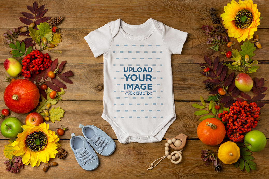Onesie Mockup Featuring a Thanksgiving-Themed Setting