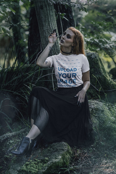 Bella Canvas T-Shirt Mockup Featuring a Woman Posing in a Forest With a Wicca Theme