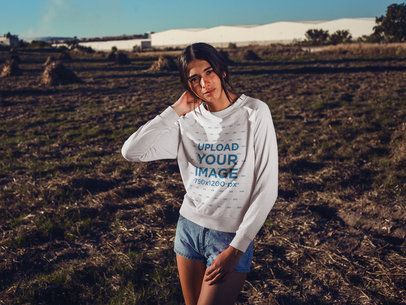 Tanned Woman Wearing a Crewneck Sweatshirt Mockup Outdoors