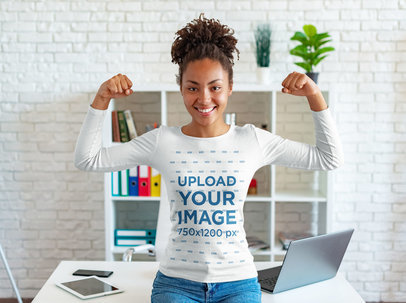 Long Sleeve Tee Mockup of a Woman with Afro Hair Flexing Her Arms