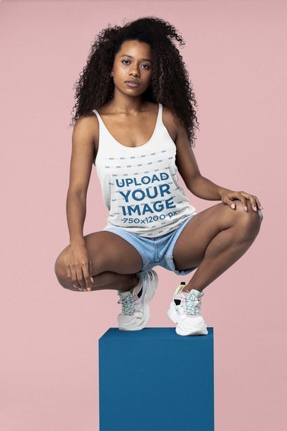 Bella Canvas Tank Top Mockup Featuring a Woman with Curly Hair in a Studio