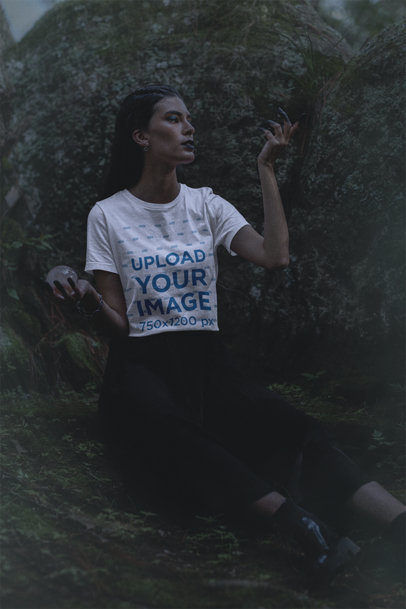 Bella Canvas T-Shirt of a Woman in a Wicca Setting Holding a Crystal Ball