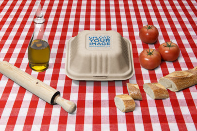 Mockup of a Clamshell Container Surrounded by Italian Food Graphics m27785a