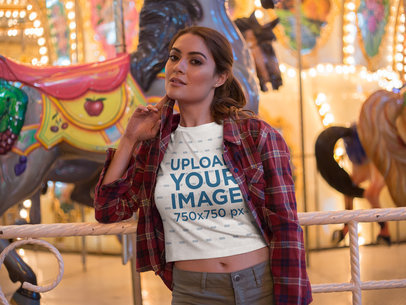 Beautiful Woman Wearing a Crop Top Mockup Near a Carousel a19446