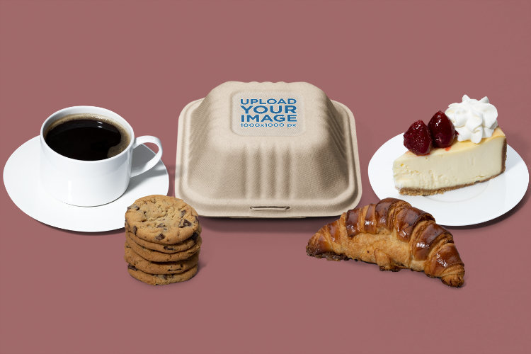 Mockup of a Clamshell Takeout Container Featuring Dessert Graphics