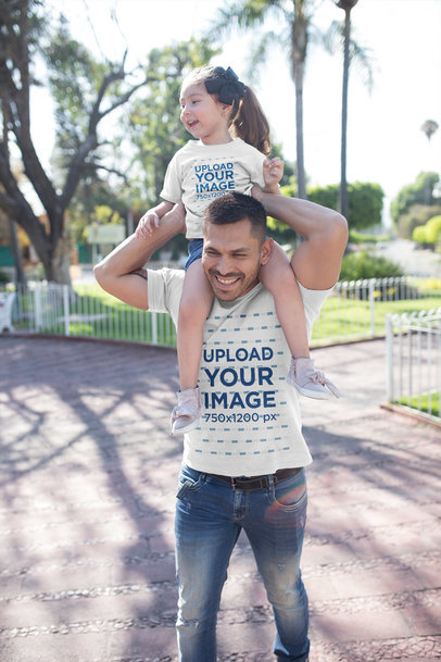 Dad and Daughter Wearing T-Shirts Mockup at a Park
