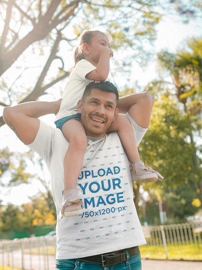 Dad with Daughter Wearing T-Shirts Mockup at the Park