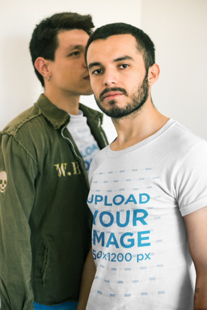 Gay T-Shirts Mockup Featuring a Man Whispering into his Boyfriend's Ear