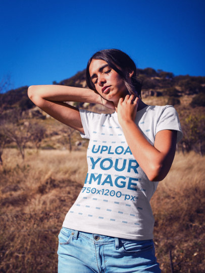 Woman Enjoying the Sun Wearing a T-Shirt Mockup Outdoors