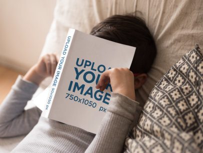 Book Mockup Lying Over a Sleeping Boy's Head a19154