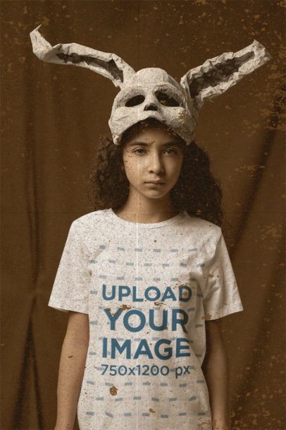 Bella Canvas Tee Mockup of a Girl with Curly Hair Wearing a Creepy Bunny Mask