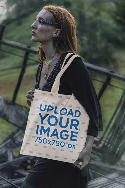 Mockup of a Woman with Graphic Makeup Carrying a Tote Bag