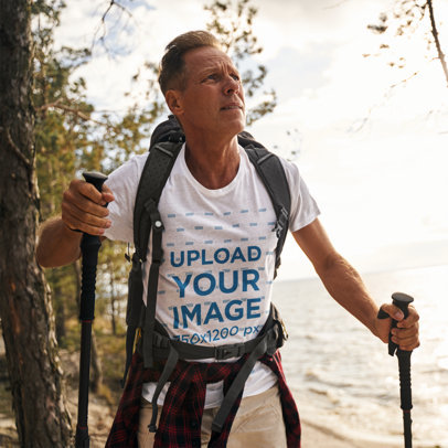 T-Shirt Mockup Featuring a Man Hiking for Canada Day