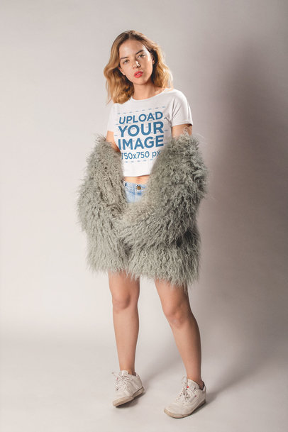 Woman with a Furry Coat Wearing a Crop Top Tee Mockup