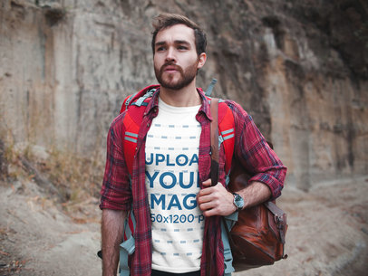 Man Exploring a Canyon Wearing a T-Shirt Mockup a19038