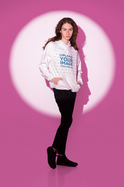 Pullover Hoodie Mockup Featuring a Man with Long Hair Posing in a Studio