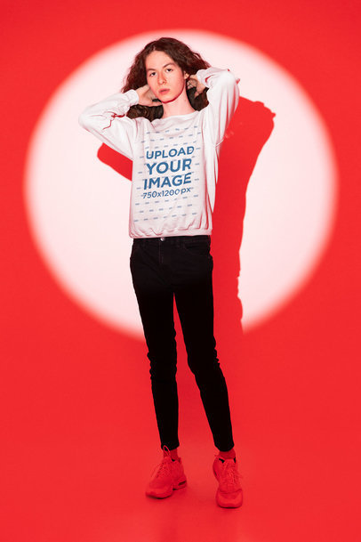 Round-Neck Sweatshirt Mockup of a Man with Long Hair Posing in a Spotlight