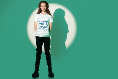 Mockup of a Man with Long Hair Wearing a Bella Canvas Tee and Boots at a Studio
