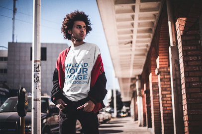 Man with Afro Wearing a T-Shirt Mockup while Standing on the Street