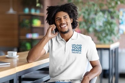Polo Shirt Mockup of a Man with an Afro Hairstyle Talking on His Smartphone m19354 r-el2