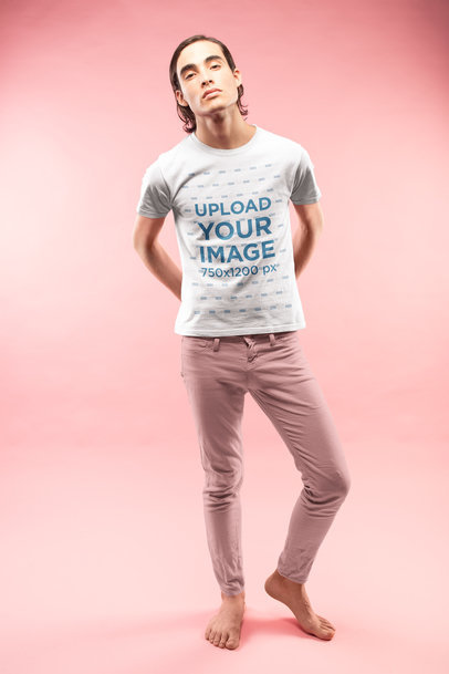 Man Posing Wearing a T-Shirt Mockup and Pink Pants