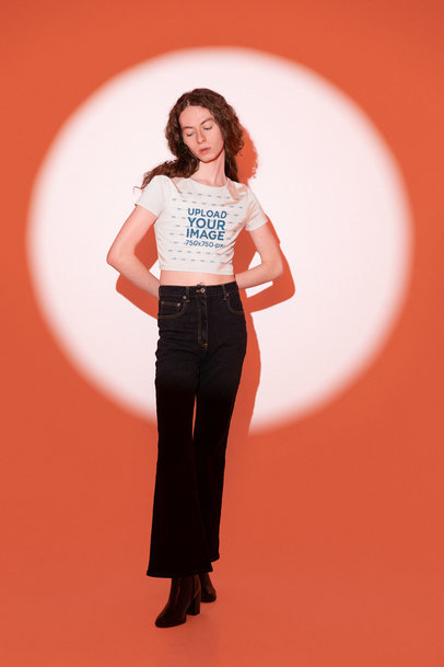 Bella Canvas Crop Top Mockup Featuring a Man Standing in a Spotlight