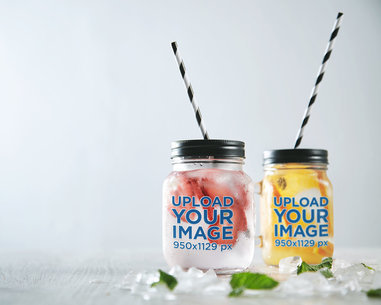 Mason Jar Mockup Featuring Two Homemade Cold Beverages