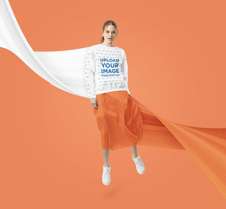 Sweatshirt Mockup of a Woman Doing a Small Jump at a Studio