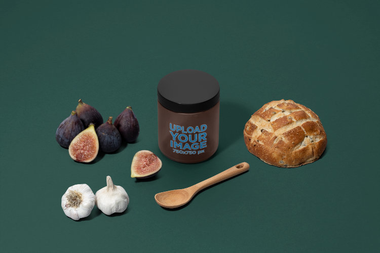 Mockup of an Amber Jar Placed by Garlic and a Loaf of Bread