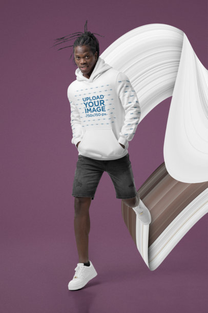 Pullover Hoodie Mockup of a Man with Braids Leaping in a Studio