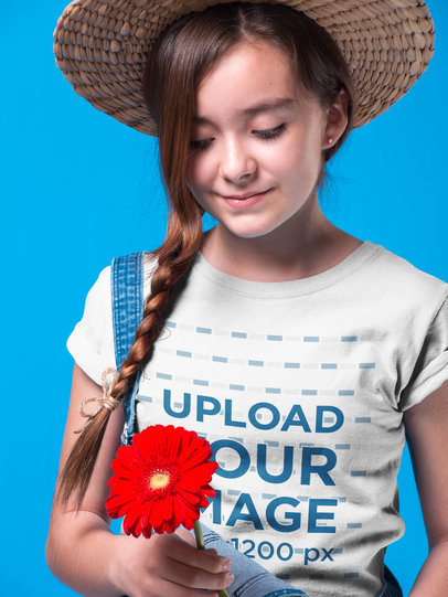 Girl Holding a Red Sunflower Wearing a T-Shirt Mockup