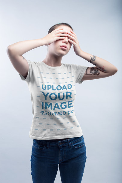 Tattooed Woman Wearing a T-Shirt Mockup Covering her Eyes