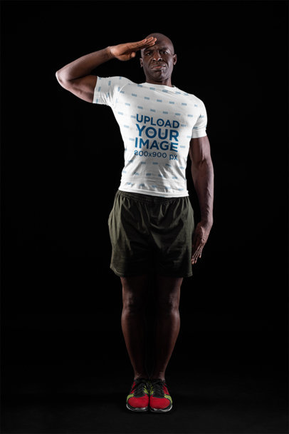 T-Shirt Mockup of a Man Doing a Military Salute for Memorial Day