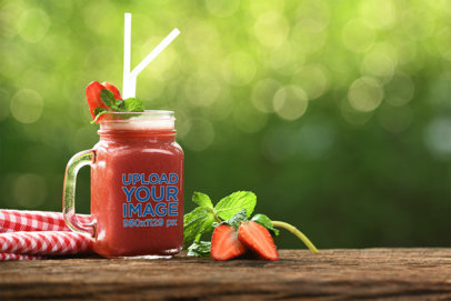 Mockup Featuring a Mason Jar Filled with a Strawberry Drink