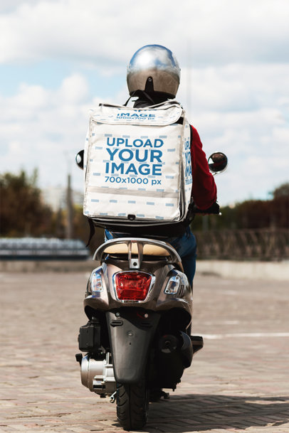 Delivery Backpack Mockup Featuring a Man Riding a Motorbike