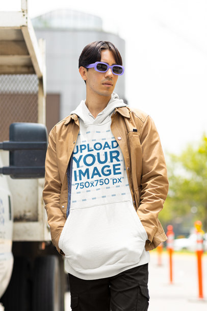 Mockup of a Man with Sunglasses Wearing a Pullover Hoodie